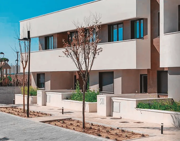 Terraced homes in a residential development with a heat pump in every home